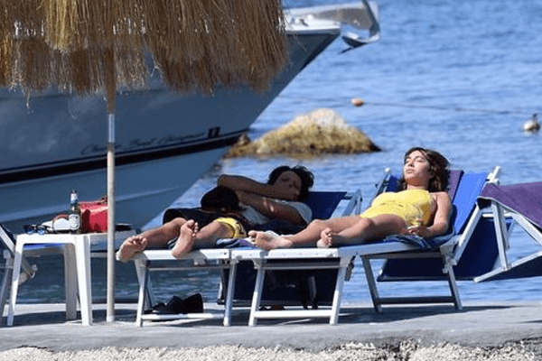 Star of OITNB, Jackie Cruz sports a yellow one piece look in Italy
