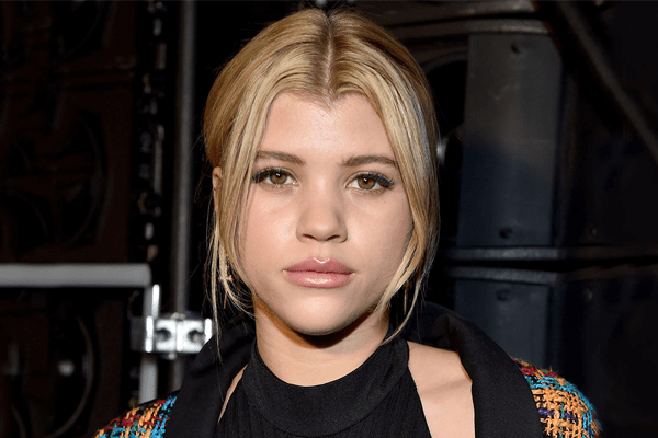No gray area! Sofia Richie looks stylish in black sweat bottoms with a white hoodie for in Beverly Hills
