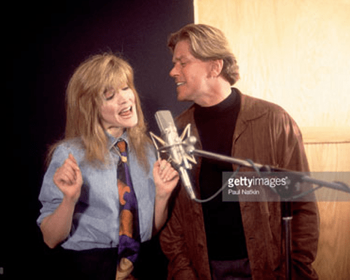 Crystal Bernard and Peter Cetera poses at River North Recording Studio, Chicago