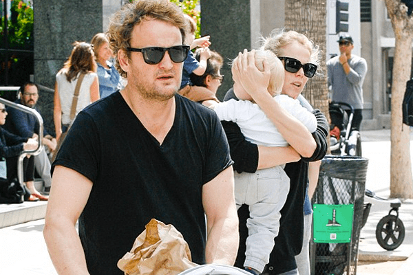 Jason Clarke with mother of his son, Cecile