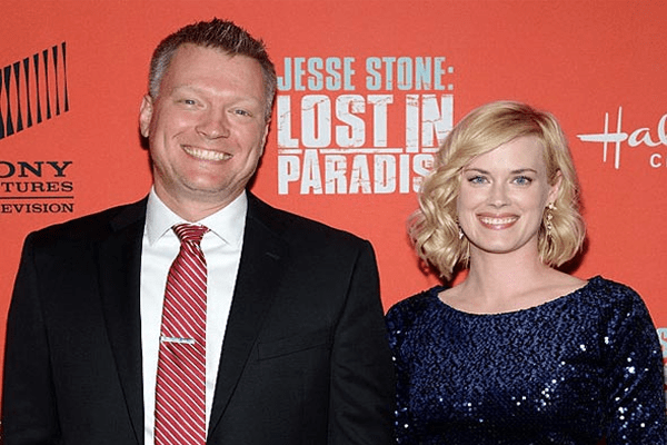 Abigail hawk with her husband in the premiere