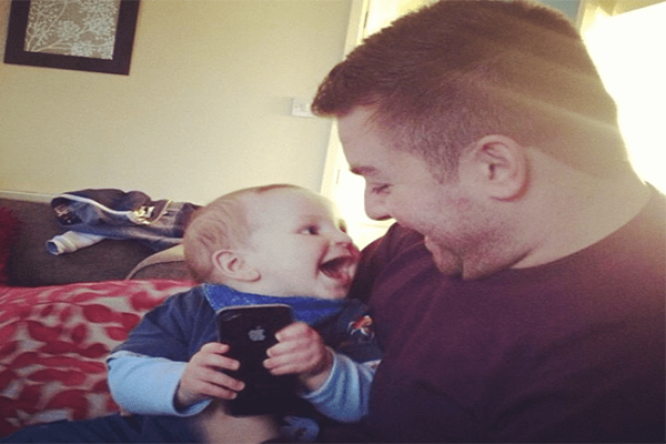 Alex Brooker with his son