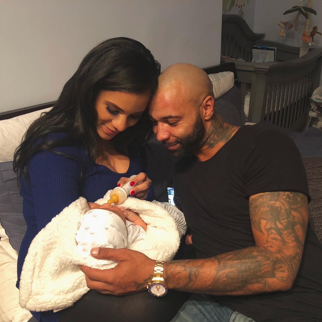 Cyn Santana and Joe Budden with their son.