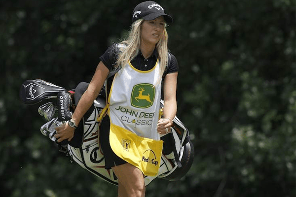 Justine Karain as a caddie