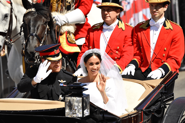 Prince Harry and Meghan Markle in carriage