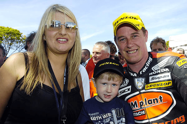 A picture of the 23 times TT Winner John McGuinness with his family 