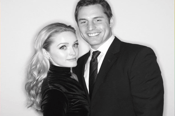 A picture of loved up couple, Tyler Konney & Greer Grammer