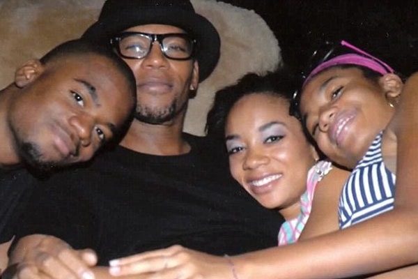 Kyle Aaris Hughley with father and sisters