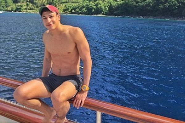 The medical researcher Clifton Dassuncao with well- tanned body