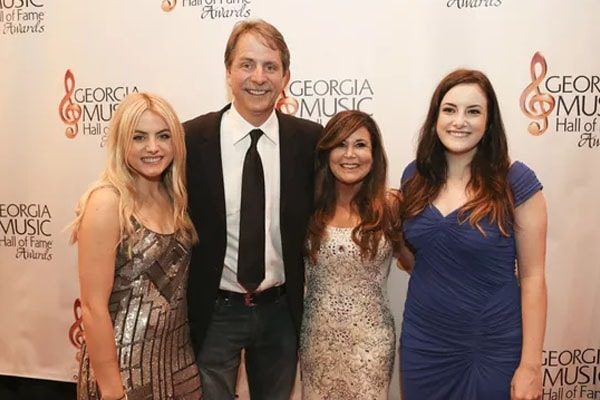 Pamela Gregg with her daughters and husband