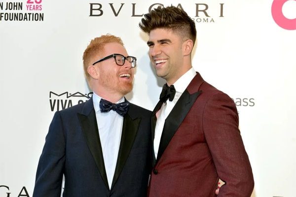 Justin Mikita and Jesse Tyler Ferguson. 