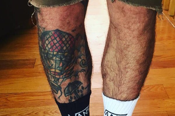 Tyler Posey leg tattoos