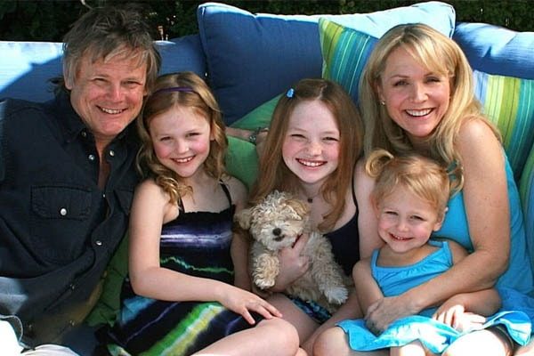 Barbara Alyn Woods with her family