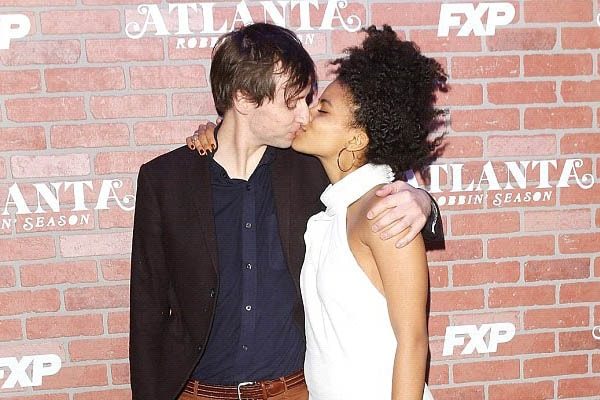 Zazie Beetz and her boyfriend David Rysdahl kissing