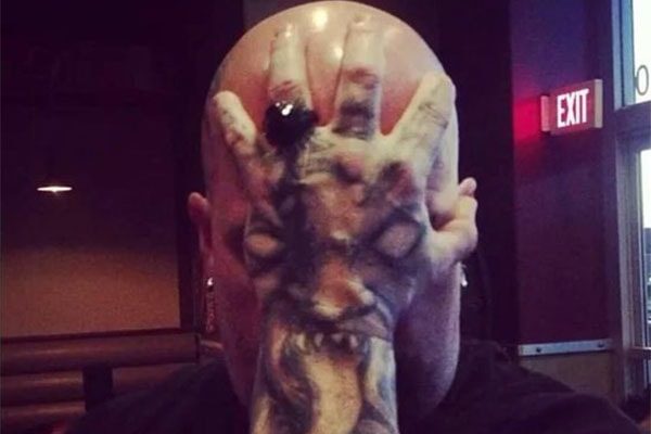 Kerry King's tattoo on his left hand