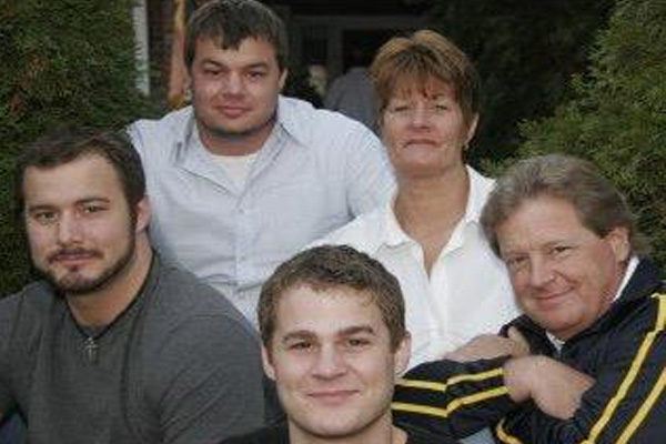 Austin Armacost's father, mother, siblings.