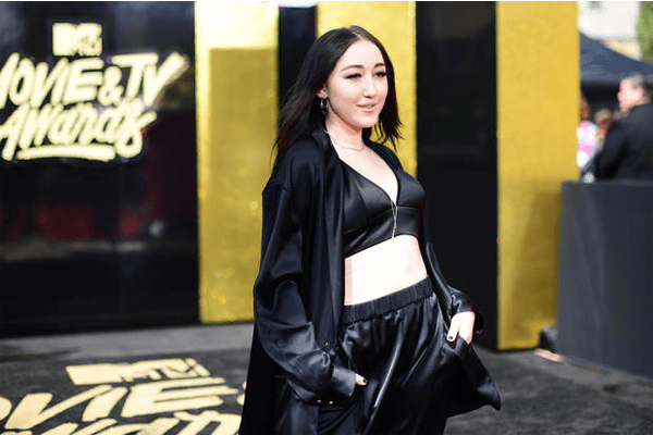 Noah Cyrus attends the 2017 MTV Movie And TV Awards- May 7, 2017 in Los Angeles photo credit:cbsnews.com