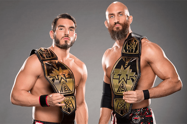 Tomaso Ciampa (Right) former teammate of Johnny displaying their NXT Tag team champions belt, who later on betrayed him.