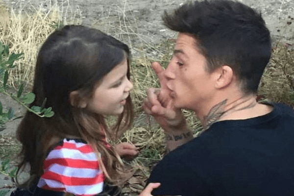 A picture of English Male model Ash Stymest with his daughter Summer Stymest
