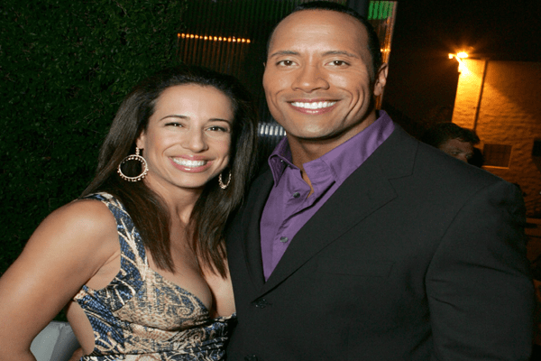 a picture of Dwayne Johnson "The rock " with his ex wife Dany Garcia