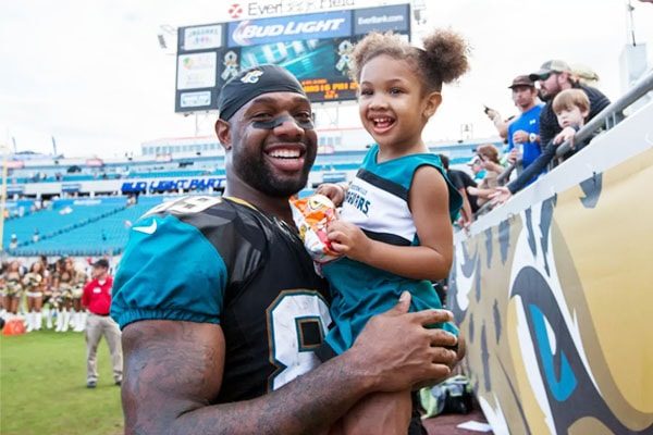 footballer Marcedes Lewis with his daughter Londyn Lewis.