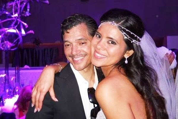Adris DeBarge and her father, El DeBarge at her wedding.