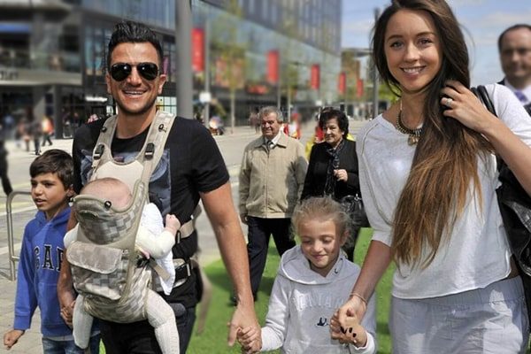 Emily MacDonagh and Peter Andre with children