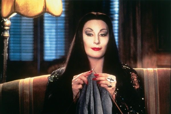 Anjelica Huston playing a role in the The Addams Family.