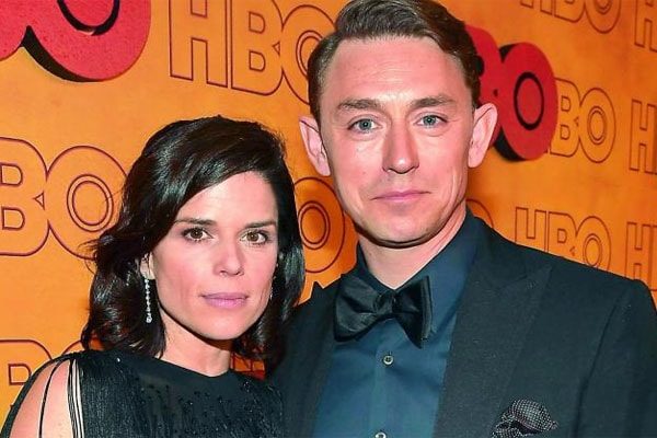 JJ Feild with Neve Campbell .