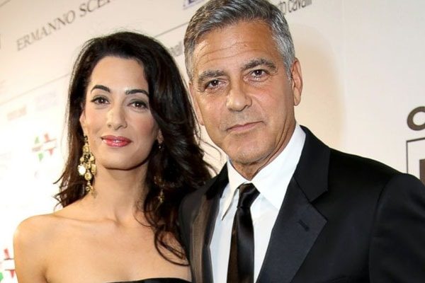 George Clooney and Amal Clooney at an event
