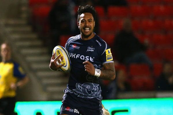 Danny Solomona playing rugby.